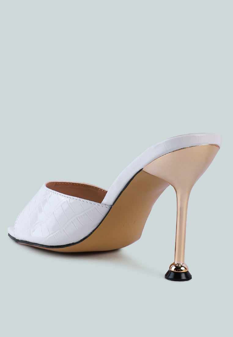 White metallic heeled pointed toed sandal with croc texture faux leather and accented with the metallic accent back view