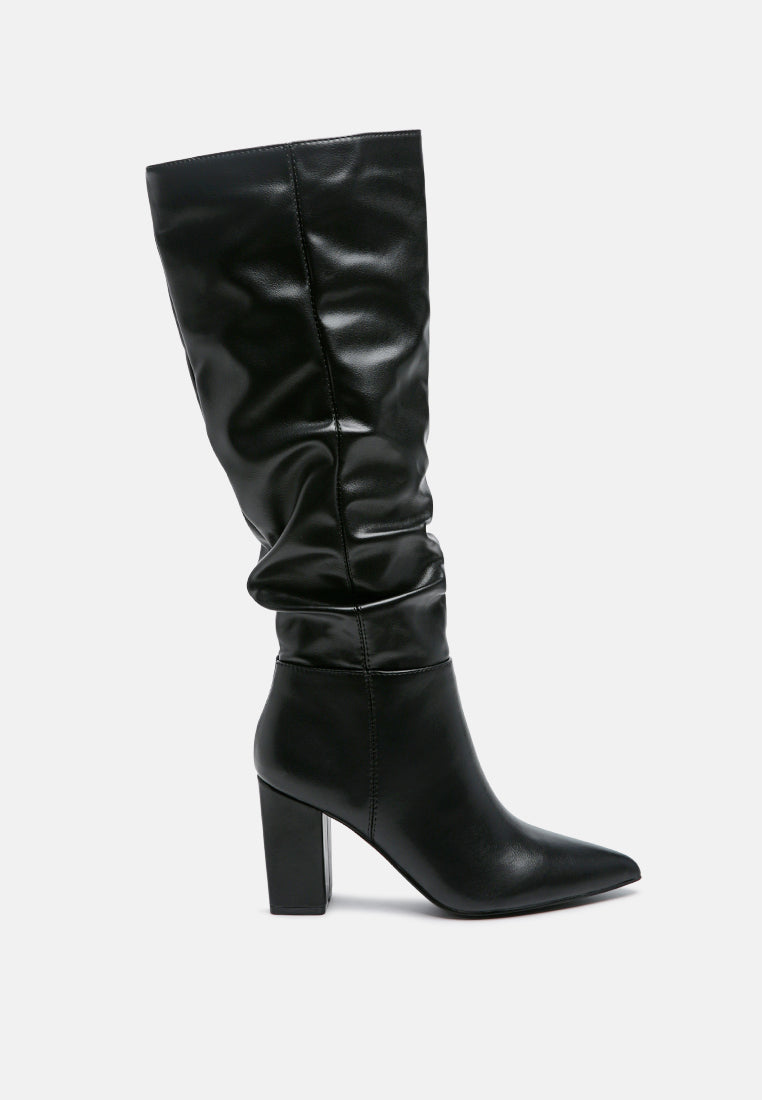 Black knee-high boot on a white background