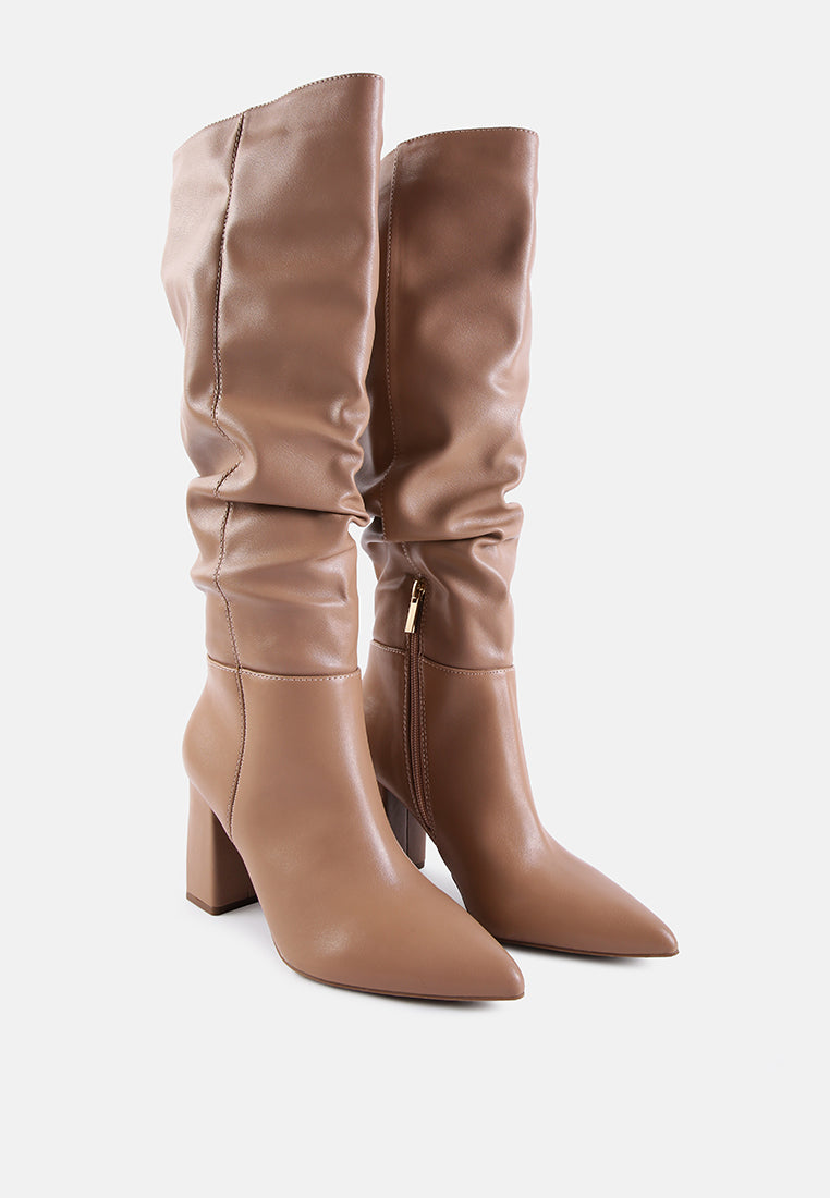 Pair of brown knee-high boots on a white background