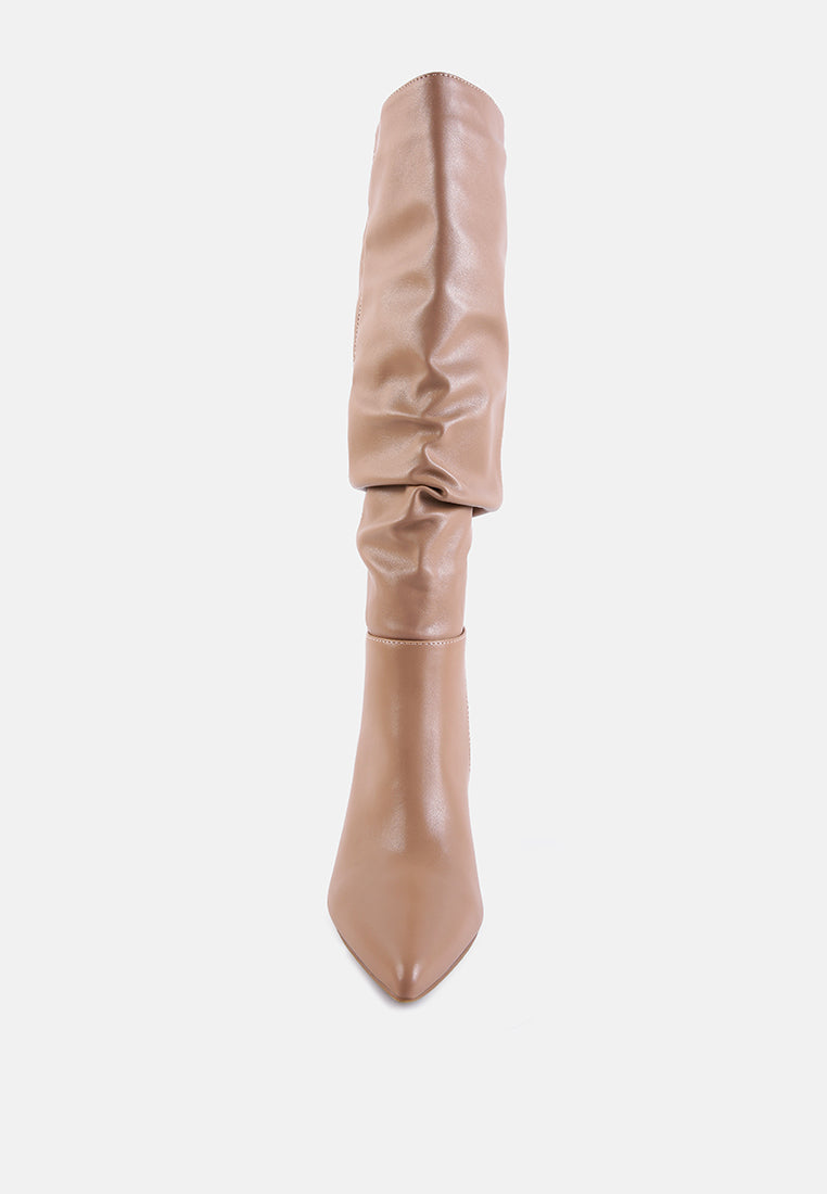 Tan leather knee-high boot on a white background