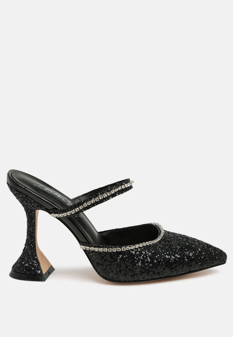 Black glitter mules with rhinestone embellishment, sculpted heel, pointed toe and crystal decorated elastic strap Side view