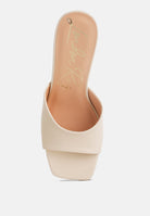 Beige wedge sandal with square toe on a white background top view