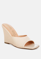 Beige wedge sandal with square toe on a white background