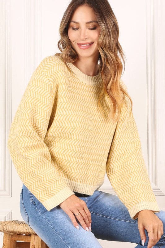 This timeless crew neck sweater with long sleeves will be your go to for years to come in its classic design and comfy fit. The herringbone pattern makes it an excellent piece for dressing up, or down. Avah Couture