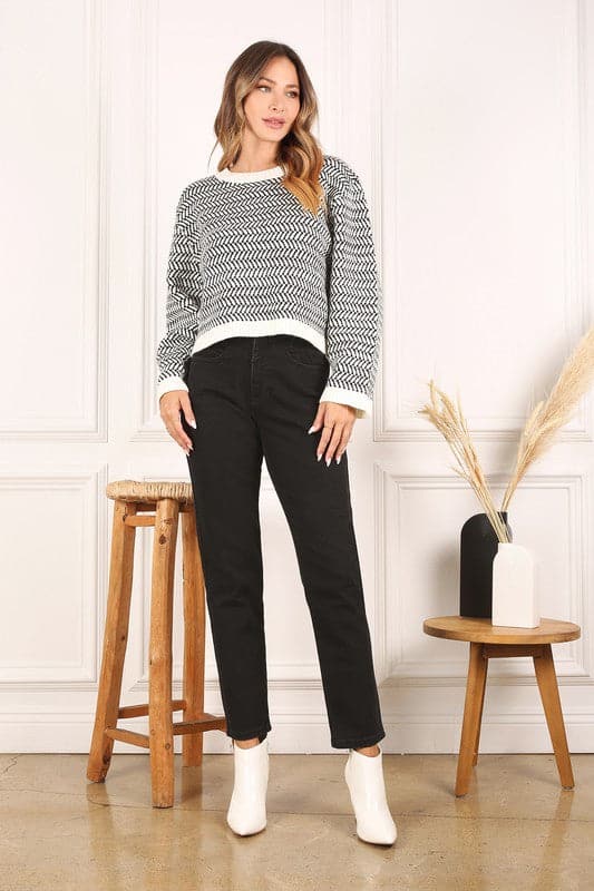 This timeless crew neck sweater with long sleeves will be your go to for years to come in its classic design and comfy fit. The herringbone pattern makes it an excellent piece for dressing up, or down. Avah Couture