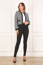 A classic piece that has timeless style, the Black And White Check Jacket is a must have this season. The heavy weight knit fabric features a black and white check pattern that gives it its name. A perfect balance of comfort and style, this jacket features 4 front snap buttons and 2 functional pockets. Wear it with your favorite outfit to work or play a classic piece to get you through any occasion! Avah Couture