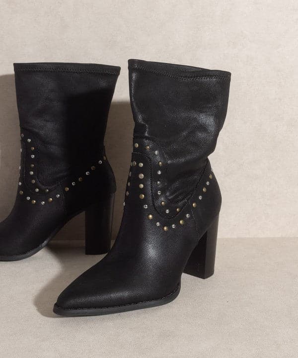 Are you ready for the streets of Paris? If yes, then slip on these high cut western boots that are embellished with studs. The Paris Awaits is a short boot with a heel that adds height to your step and completes an overall edgy look.