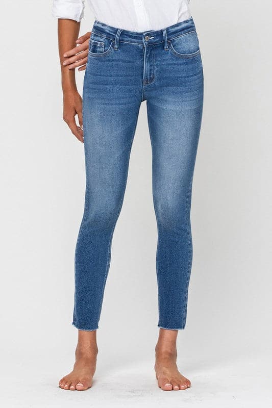 These mid-rise skinny jeans like to keep things simple. Crafted from premium stretch denim for a super comfy and flattering fit, featuring an ankle grazing crop length and raw hemline. This modern style will look amazing with anything from flats and sneakers to boots and heels. Avah Couture