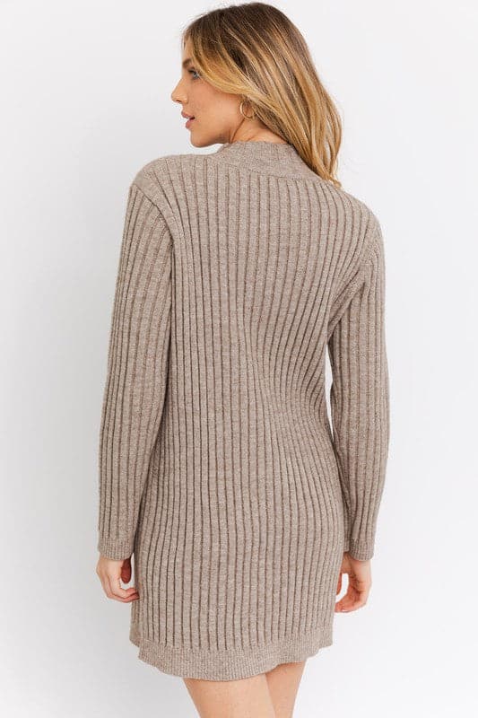 You’ll want to wear this cozy sweater dress all fall and winter long. It pairs perfectly with boots, tights and denim jackets, giving you a perfect combination of style and comfort. Can also be worn as a top with leggings or high rise jeans for an ultra chic look. Avah Couture