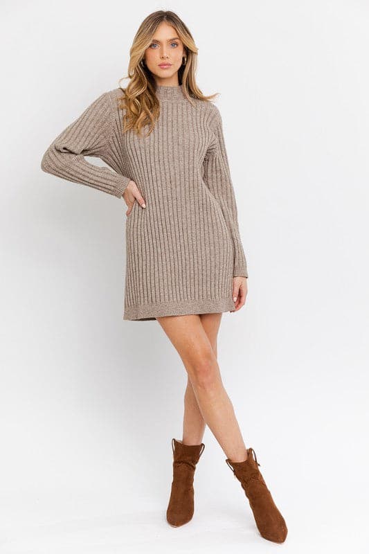 You’ll want to wear this cozy sweater dress all fall and winter long. It pairs perfectly with boots, tights and denim jackets, giving you a perfect combination of style and comfort. Can also be worn as a top with leggings or high rise jeans for an ultra chic look. Avah Couture