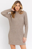 You’ll want to wear this cozy sweater dress all fall and winter long. It pairs perfectly with boots, tights and denim jackets, giving you a perfect combination of style and comfort. Can also be worn as a top with leggings or high rise jeans for an ultra chic look. Avah Couture