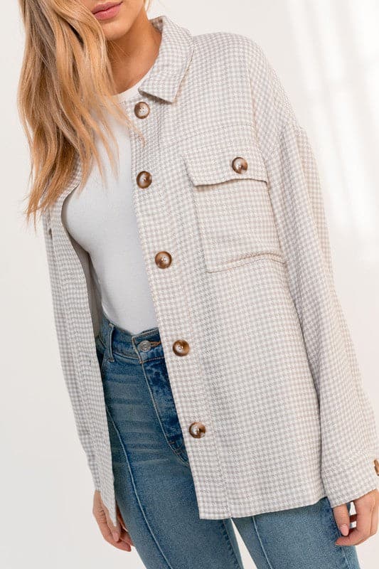 Effortless style and comfort for everyday, you’ll love this oversized jacket! It’s perfect for work, the weekend, traveling or just lounging around. Designed with button front detail, collar and large chest pocket with on-trend Gingham print.