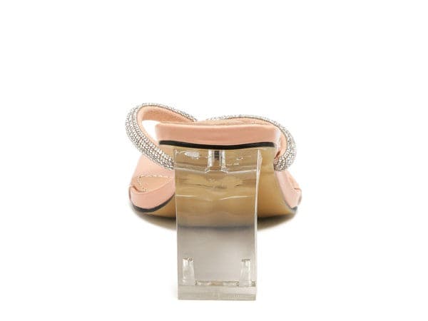 Crisp and clean, these high heel sandals are all about luxury. The crystal-embellished y-front design is glamorous and gorgeous with little effort. The thong strap makes them comfortable to wear while adding a feminine touch that makes you feel ready for anything- Avah Couture