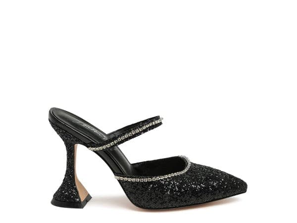 The perfect pair of glitter mules with rhinestone embellishment, designed to make you shine. Featuring a sculpted heel, pointed toe and crystal decorated elastic strap. Avah Couture