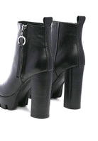A must have for your fall and winter outfits, this pair of very stylish high heel boots will give you a fashion edge. With a block heel, pointy toe and side zipper detail, this boot is a show stopper. Crafted with quality materials, this ankle boot can be used for many season to come. Avah Couture