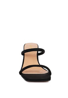 The Eternity is a double-strap sandal with a unique resin chain heel that adds a new dimension to this classic style. This mid-heel sandal is feminine, fun, and a perfect addition to your shoe collection.  Avah Couture