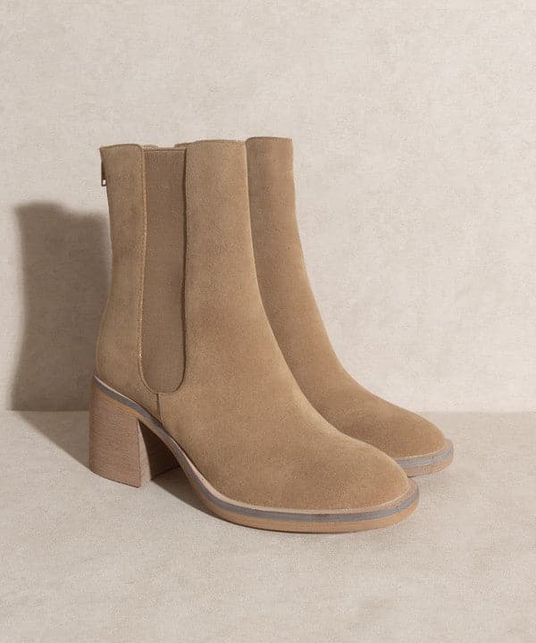 With a nod to Chelsea vintage roots and a perfect fit for the modern woman, the Lily is an effortlessly cool ankle boot. Crafted in rustic neutral tones, it comes with a block heel and elastic panel for easy pull on wear and comfort. Avah Couture