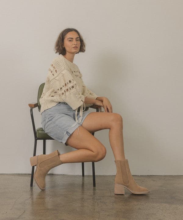 With a nod to Chelsea vintage roots and a perfect fit for the modern woman, the Lily is an effortlessly cool ankle boot. Crafted in rustic neutral tones, it comes with a block heel and elastic panel for easy pull on wear and comfort. Avah Couture