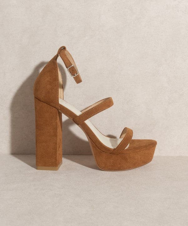 Luxurious simplicity at its finest, the Raelynn is a statement heel designed to elevate your look. The stunning suede upper features open toe styling, as well as an ultra high platform and 5” heel height. Furture classics for your everyday wardrobe!