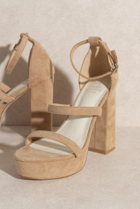 Luxurious simplicity at its finest, the Raelynn is a statement heel designed to elevate your look. The stunning suede upper features open toe styling, as well as an ultra high platform and 5” heel height. Furture classics for your everyday wardrobe!