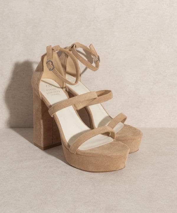 Luxurious simplicity at its finest, the Raelynn is a statement heel designed to elevate your look. The stunning suede upper features open toe styling, as well as an ultra high platform and 5” heel height. Furture classics for your everyday wardrobe!