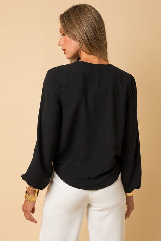Isabella Surplice Shoulder Shirring Blouse. Our stunning, versatile surplice top was made for you. With shoulder shirring, this blouse is perfect for day or night and can be dressed up or down. The material is truly luxurious and the design is sophisticated and chic. 