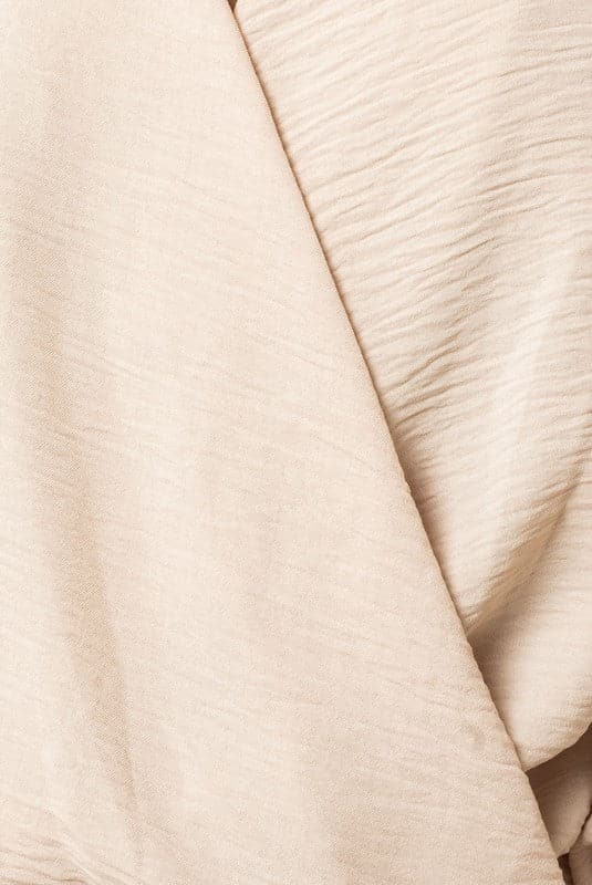Isabella Surplice Shoulder Shirring Blouse. Our stunning, versatile surplice top was made for you. With shoulder shirring, this blouse is perfect for day or night and can be dressed up or down. The material is truly luxurious and the design is sophisticated and chic. 