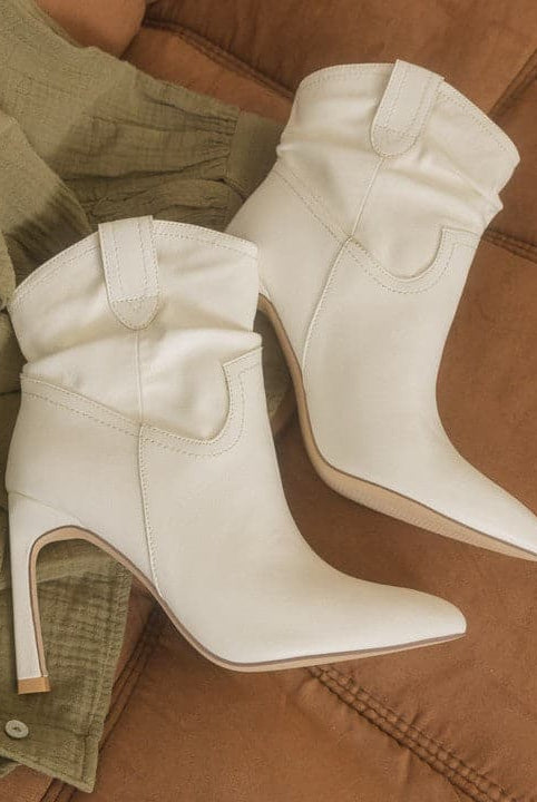 Western style is elevated with the Katie, a stiletto heel bootie. The silhouette is simple and elegant, completing any ensemble with almost effortless ease.  A versatile style for all seasons.