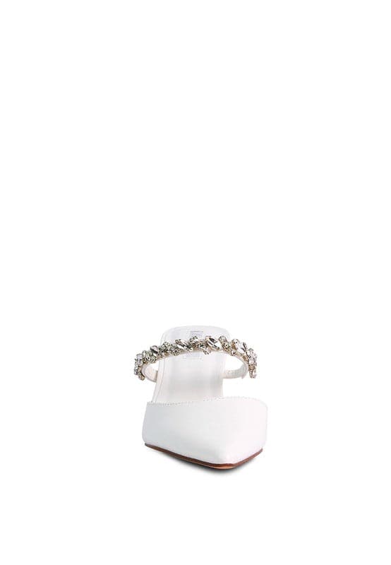 These elegant mid heels with rhinestone detail straps are the perfect finishing touch for your look. The pointed toe and sleek, sophisticated silhouette make them ideal for evening wear or just day to night style. Light, cushioning, with a dainty diamanté strap across the top, theses shoes can be paired with anything from jeans too dresses. 