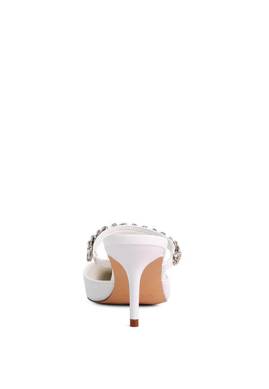 These elegant mid heels with rhinestone detail straps are the perfect finishing touch for your look. The pointed toe and sleek, sophisticated silhouette make them ideal for evening wear or just day to night style. Light, cushioning, with a dainty diamanté strap across the top, theses shoes can be paired with anything from jeans too dresses. 