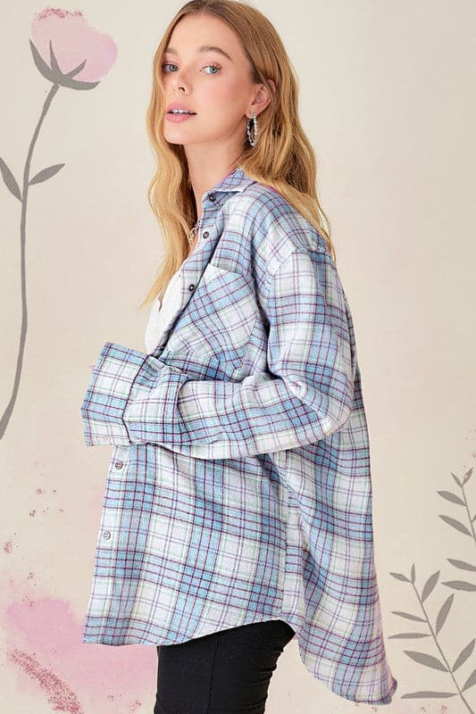 Everyday comfort meets stylish design in this soft and lightweight flannel shirt. The long sleeves, buttoned cuffs, and patch pocket at the chest create a classic look perfect for your all your casual wear.  Avah Couture