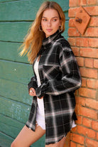 Your new favorite flannel! This oversized checkered plaid shirt is an essential top to add to your closet. Featuring a nice, oversize silhouette and subtle distressing at the sleeves and hemline. This plaid flannel shirt has long sleeves, full button front and will add effortless style to your wardrobe. Great paired with everything from denim to trousers, this comfy flannel shirt is great for loungewear days or weekend wear!  Avah Couture