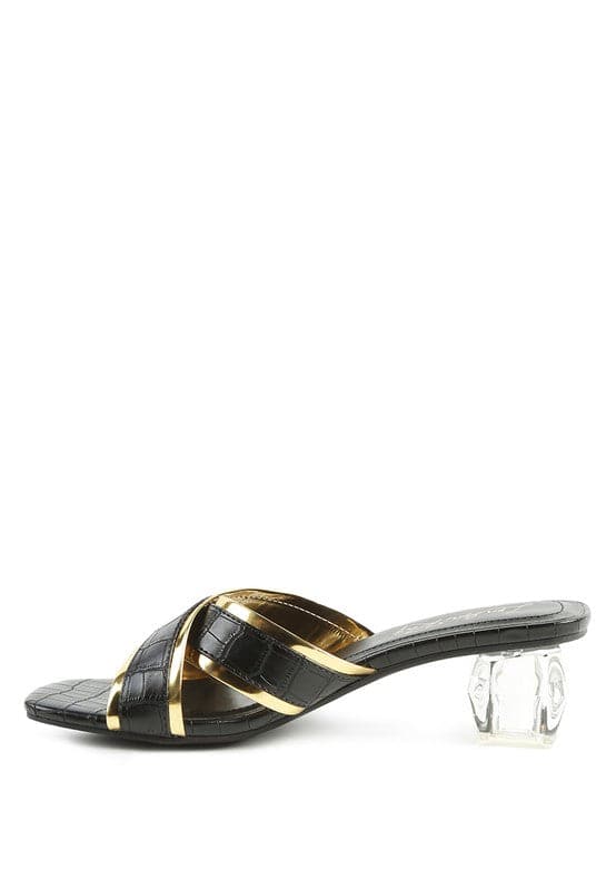 Set yourself apart from the rest with these stunning metallic outlined slides. The sculpted clear heel adds a touch of luxury, and the croc textured upper gives them a statement-making finishing touch-Avah Couture