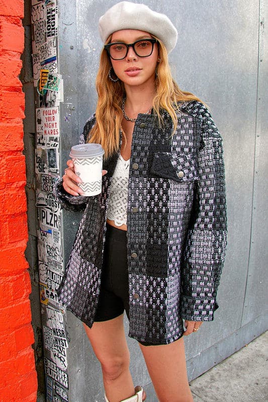 Give your daytime look an effortless update with this checked coat. Featuring a brushed material, oversized fit and long sleeve design, this piece is perfect for autumn and looks great over jeans or leather leggings.  Avah Couture