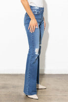 Go authentic with these distressed, high waisted jeans. The bootcut legs and five button fly provide the perfect amount of stretch for optimum comfort and a relaxed feel. A classic look that’s sure to last through trends without fail! Avah Couture