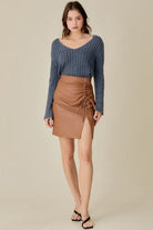 This knitted pullover is the perfect piece for you to wear in any season. With a loose and relaxed fit, it is designed to be paired with anything from jeans to shorts to skirts to dresses. It features a cropped style, which allows you to dress it up or down. It also has a v neck front which adds an elegant touch for those more formal affairs. In short, this sweater is versatile and can be worn by anyone at anytime in any environment. Avah Couture