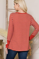 The Stripe Light Sweater is a cozy fall staple for every girl’s closet. With a relaxed fit and flattering twist front, this top can be styled with comfortable jeans or your favorite leggings. The lace trim sleeves add a romantic touch to the design, making it perfect for date night or an afternoon coffee date with friends.