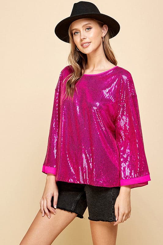 Celebrate any special occasion in this festive top! Featuring a solid sequin design, round neck and bell sleeves, as well as full lining, it’s the perfect addition to your party wardrobe. Perfect for celebrating the holidays! Avah Couture