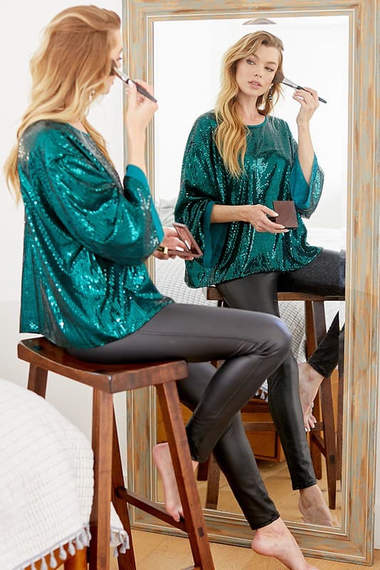 Celebrate any special occasion in this festive top! Featuring a solid sequin design, round neck and bell sleeves, as well as full lining, it’s the perfect addition to your party wardrobe. Perfect for celebrating the holidays! Avah Couture