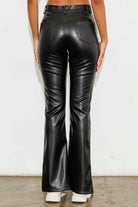 Add a touch of luxury to your wardrobe with these vegan leather pants. Chic, yet comfortable and stylish, they’re versatile enough to be worn anywhere. High waisted with a button fly closure, the front slit detail adds interest to the design while the stretch fabric helps these pants move with you throughout the day.   Avah Couture