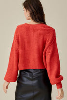 Turn heads in this chic, sophisticated and sexy round neck crop sweater. This drop shoulder knit sweater is perfect for an evening out on the town, date night and more. Pair with leggings and booties for a casual look or dress it up with a mini skirt for a night out. Avah Couture