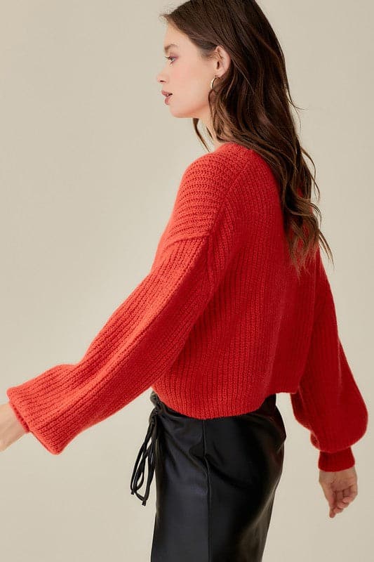 Turn heads in this chic, sophisticated and sexy round neck crop sweater. This drop shoulder knit sweater is perfect for an evening out on the town, date night and more. Pair with leggings and booties for a casual look or dress it up with a mini skirt for a night out. Avah Couture