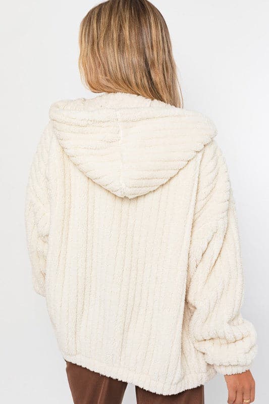 This oversized hoodie jacket is the ultimate in cozy winter style. It features a zipper front and pockets, a relaxed fit and is super soft and comfortable to wear. Zip up and stay warm! Avah Couture