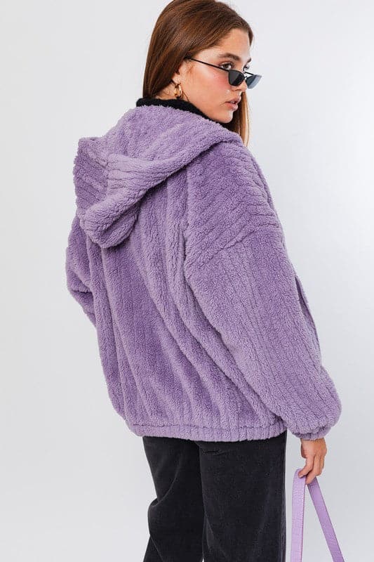 This oversized hoodie jacket is the ultimate in cozy winter style. It features a zipper front and pockets, a relaxed fit and is super soft and comfortable to wear. Zip up and stay warm! Avah Couture