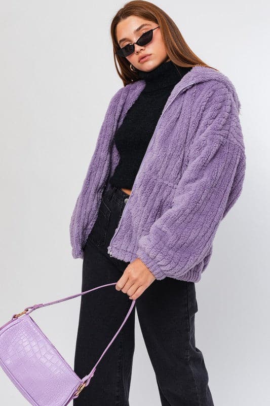 This oversized hoodie jacket is the ultimate in cozy winter style. It features a zipper front and pockets, a relaxed fit and is super soft and comfortable to wear. Zip up and stay warm! Avah Couture