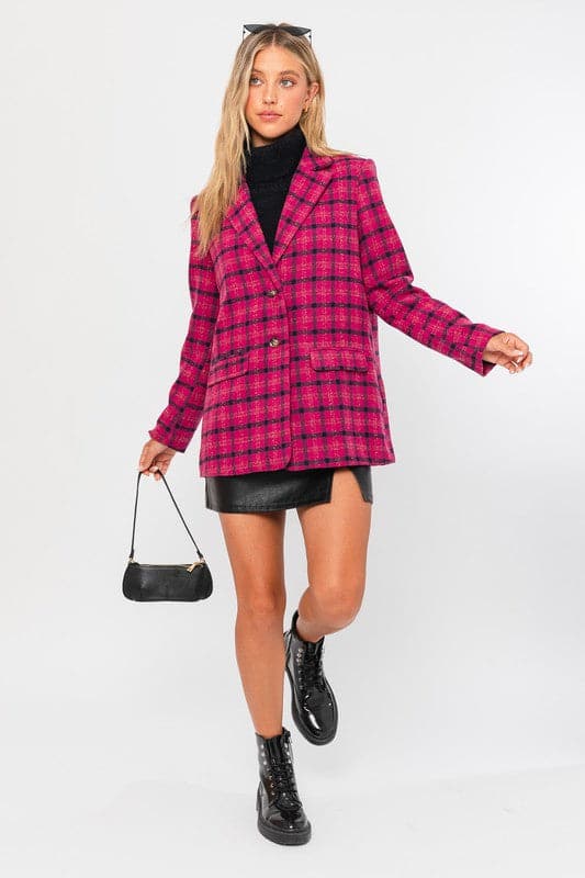 This blazer is the perfect way to add a pop of color and style to your wardrobe. Features a classic silhouette, notched lapel, two button closure and trendy plaid pattern. This stylish jacket can easily be dressed up or down, and will become one of your favorites for years to come. Avah Couture