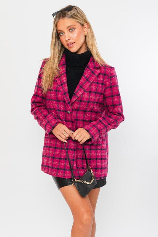 This blazer is the perfect way to add a pop of color and style to your wardrobe. Features a classic silhouette, notched lapel, two button closure and trendy plaid pattern. This stylish jacket can easily be dressed up or down, and will become one of your favorites for years to come. Avah Couture