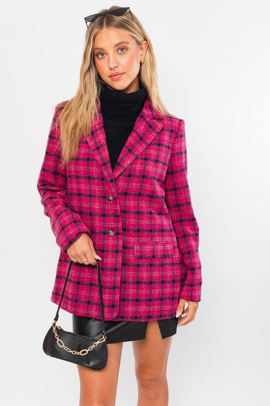 This blazer is the perfect way to add a pop of color and style to your wardrobe. Features a classic silhouette, notched lapel, two button closure and trendy plaid pattern. This stylish jacket can easily be dressed up or down, and will become one of your favorites for years to come. Avah Couture