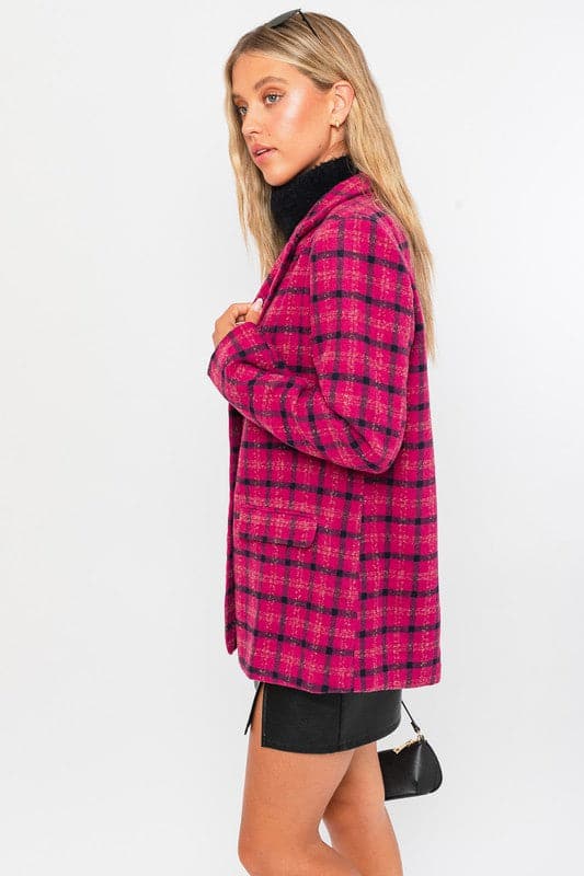 This blazer is the perfect way to add a pop of color and style to your wardrobe. Features a classic silhouette, notched lapel, two button closure and trendy plaid pattern. This stylish jacket can easily be dressed up or down, and will become one of your favorites for years to come. Avah Couture