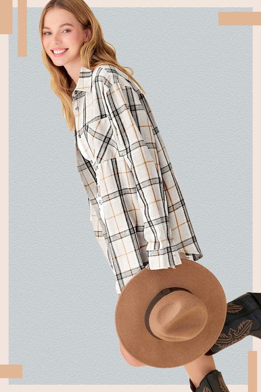A classic plaid shirt is a staple you’ll wear all year long. Featuring a collar with a button down front, chest pocket, and long sleeves that you can roll up or down. Made with an oversized fit for an easy, effortless vibe.  Avah Couture